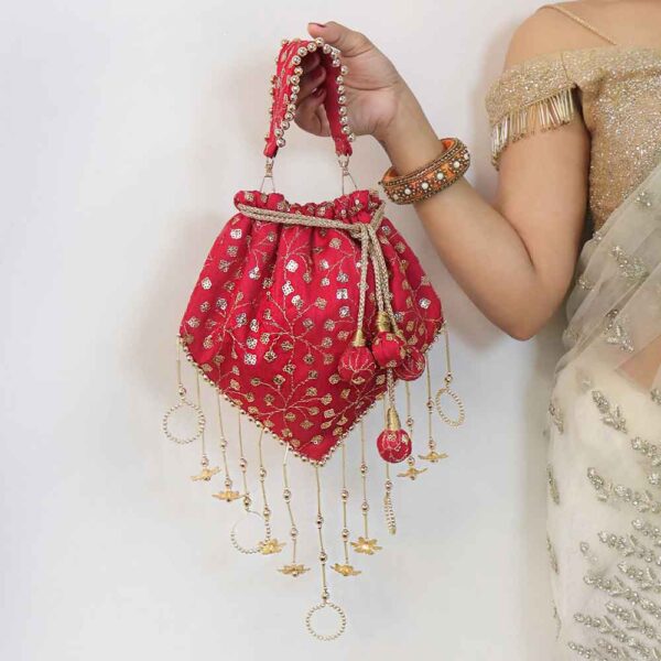 Maroon Tassle Triangle Potli Bag